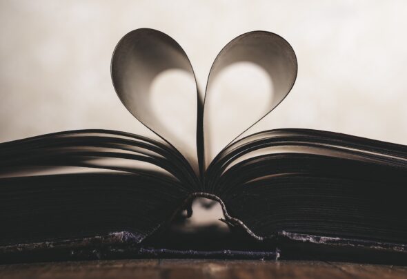 Book pages folded in a heart shape
