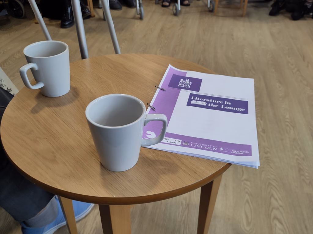 Notes of Literature in the Lounge on table with tea cups